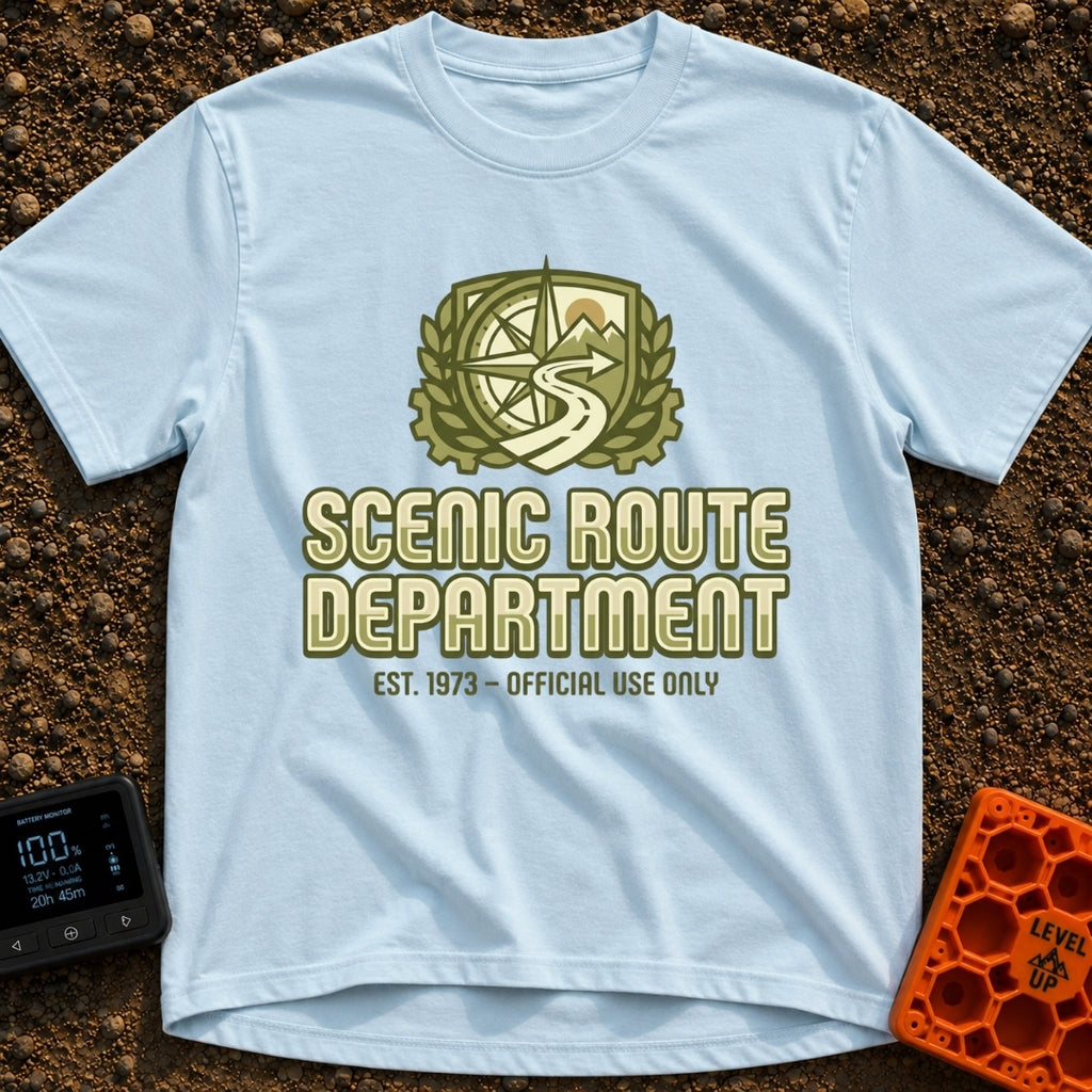 Scenic Route Authority - T-Shirt in Chambray - An olive green crest graphic featuring a compass, mountains, a sun, and a...