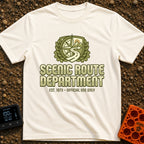 Scenic Route Authority - T-Shirt in Ivory - An olive green crest graphic featuring a compass, mountains, a sun, and a...