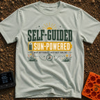 Solar Power Trip - T-Shirt in Bay - A typographic design featuring the text "SELF-GUIDED" above a yellow full-battery...