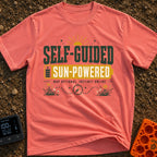 Solar Power Trip - T-Shirt in Watermelon - A typographic design featuring the text "SELF-GUIDED" above a yellow...