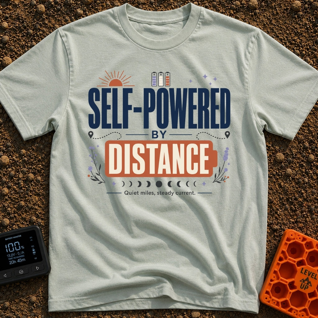 Charged By Distance - T-Shirt in Bay - A typographic design reading "SELF-POWERED BY DISTANCE" with the word "DISTANCE"...