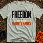 Freedom Requires Maintenance - T-Shirt in Bay - Text-based design reading "SERVICE NOTICE: FREEDOM REQUIRES MAINTENANCE"...