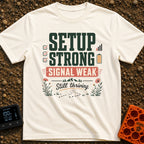 Weak Signal Still Thriving - T-Shirt in Ivory - A typographic design reading "SETUP STRONG SIGNAL WEAK Still thriving."...