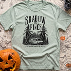 In The Pines - T-Shirt in Bay - A black and white illustration of a camper van with a large roof-mounted solar array...