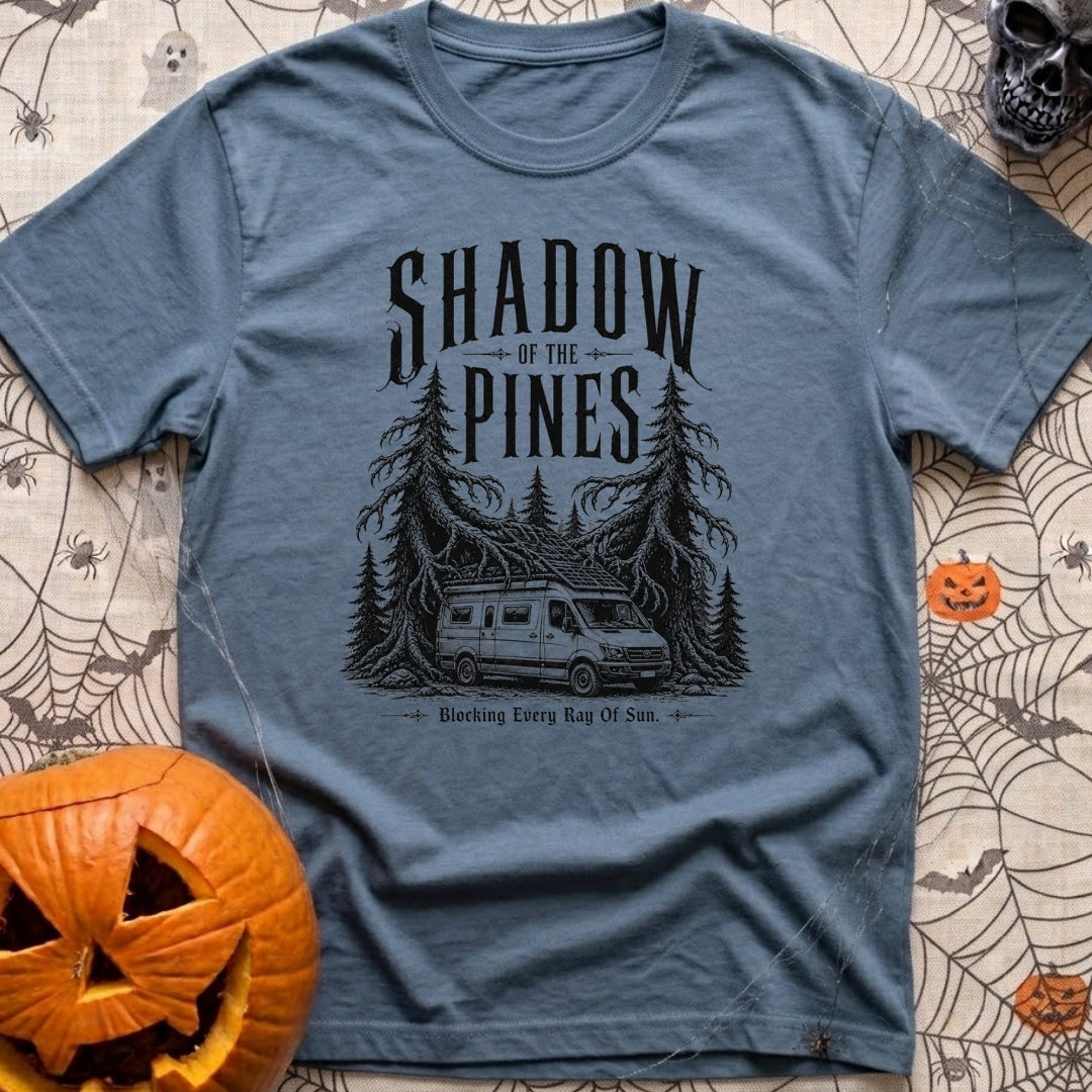 In The Pines - T-Shirt in Blue Jean - A black and white illustration of a camper van with a large roof-mounted solar...