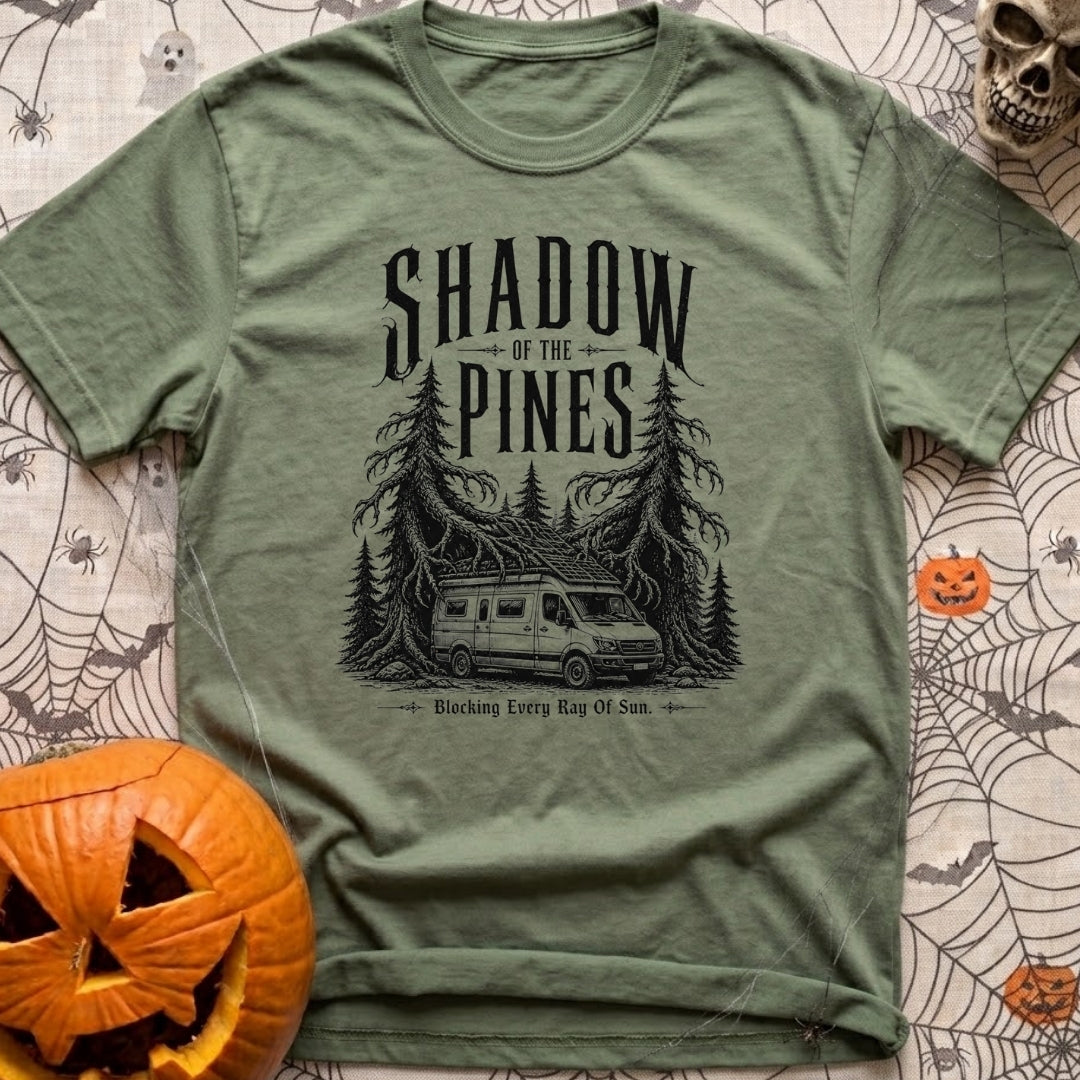 In The Pines - T-Shirt in Moss - A black and white illustration of a camper van with a large roof-mounted solar array...