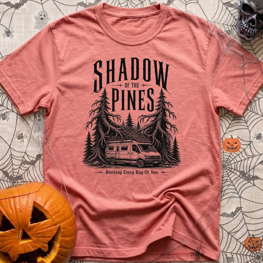 In The Pines - T-Shirt in Watermelon - A black and white illustration of a camper van with a large roof-mounted solar...