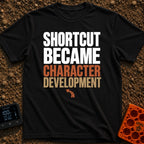 Shortcut to Growth - T-Shirt in Black - A text-based design featuring the phrase 'SHORTCUT BECAME' in faint white...