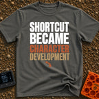 Shortcut to Growth - T-Shirt in Pepper - A text-based design featuring the phrase 'SHORTCUT BECAME' in faint white...