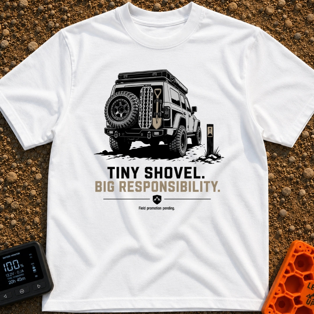 Dig Tiny Adventures - T-Shirt in White - A rear-view illustration of a rugged 4x4 off-road vehicle parked near a mountain...