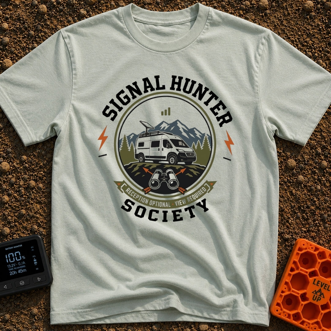 Views Over Bars - T-Shirt in Bay - A circular badge illustration showing a white camper van equipped with a roof-mounted...