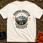 Views Over Bars - T-Shirt in Ivory - A circular badge illustration showing a white camper van equipped with a...