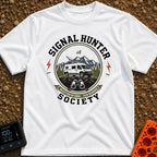 Views Over Bars - T-Shirt in White - A circular badge illustration showing a white camper van equipped with a...