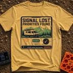 Signal Lost Bliss - T-Shirt in Mustard - A graphic of a white camper van parked in front of green and white mountains,...