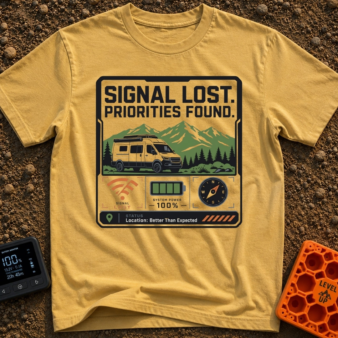 Signal Lost Bliss - T-Shirt in Mustard - A graphic of a white camper van parked in front of green and white mountains,...