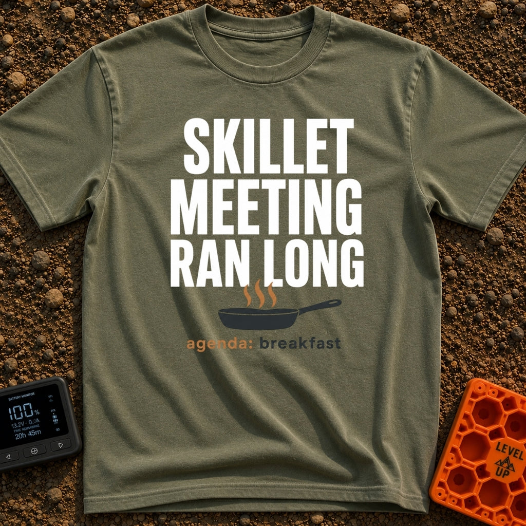 Skillet Meeting Ran Long - T-Shirt in Moss - Text reading "SKILLET MEETING RAN LONG" above an illustration of a black...