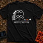 Skip The Line - T-Shirt in Black - A minimalist line drawing of a roller coaster track that incorporates a large clock...