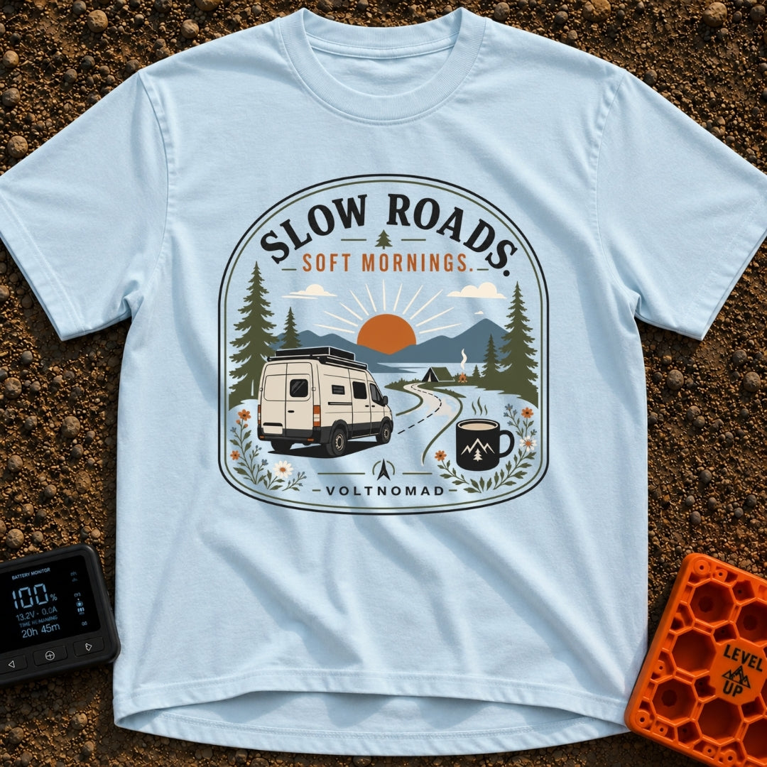 Sip Slow Roll Easy - T-Shirt in Chambray - A graphic illustration of a white camper van driving on a winding road toward...