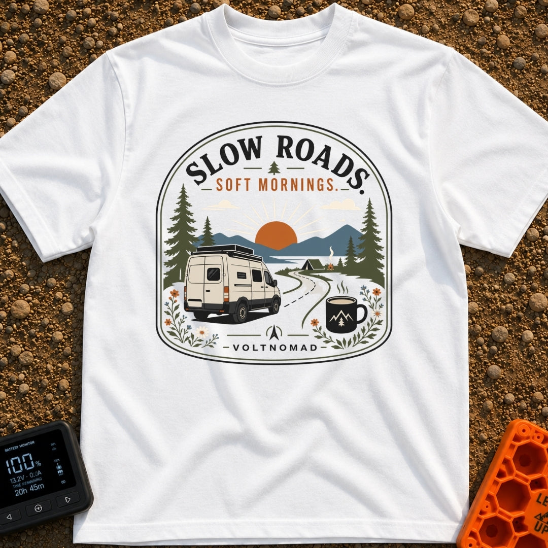 Sip Slow Roll Easy - T-Shirt in White - A graphic illustration of a white camper van driving on a winding road toward a...