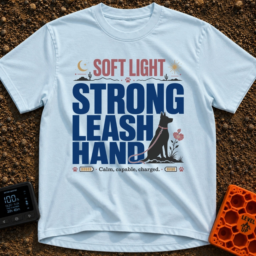 Leash The Day - T-Shirt in Chambray - A typographic design featuring the text "SOFT LIGHT STRONG LEASH HAND" alongside...