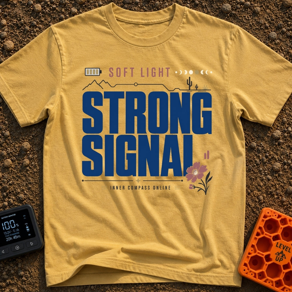 Soft Light Strong Signal - T-Shirt in Mustard - A typographic design with the text 'SOFT LIGHT' and 'STRONG SIGNAL',...