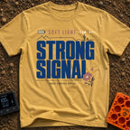 Soft Light Strong Signal - T-Shirt in Mustard - A typographic design with the text 'SOFT LIGHT' and 'STRONG SIGNAL',...