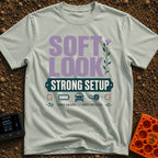 Soft Look Hard Wired - T-Shirt in Bay - The design features the text "SOFT LOOK" in large purple letters beside a floral...