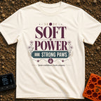 Soft Power Strong Paws - T-Shirt in Ivory - A typographic design with the words "SOFT POWER" above a banner reading...