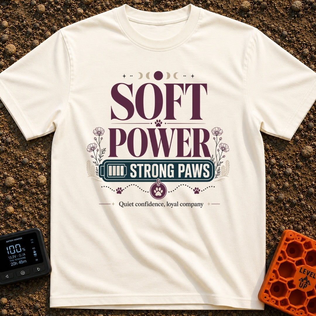 Soft Power Strong Paws - T-Shirt in Ivory - A typographic design with the words "SOFT POWER" above a banner reading...