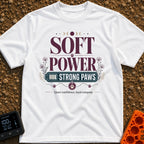 Soft Power Strong Paws - T-Shirt in White - A typographic design with the words "SOFT POWER" above a banner reading...