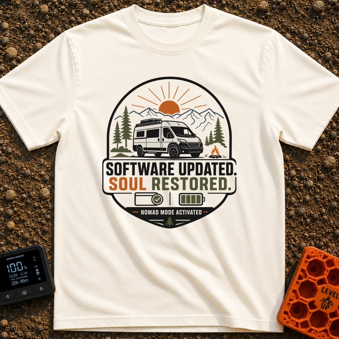 Soul Update Complete - T-Shirt in Ivory - A circular badge design featuring a white camper van parked beside a campfire,...