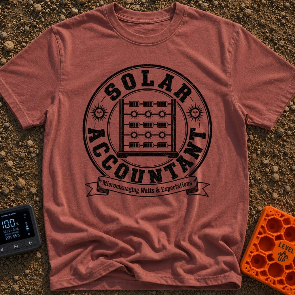 Watt Is My Balance - T-Shirt in Brick - A distressed black-and-white circular emblem featuring an abacus whose beads are...