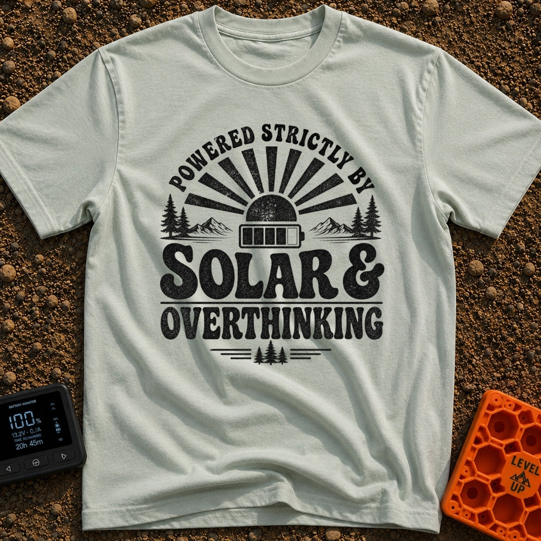 Solar Powered Overthinking - T-Shirt in Bay - A distressed, black-and-white typographic design reading 'POWERED STRICTLY...