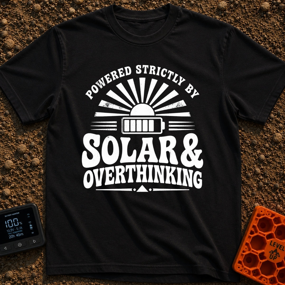 Solar Powered Overthinking - T-Shirt in Black - A distressed, black-and-white typographic design reading 'POWERED...