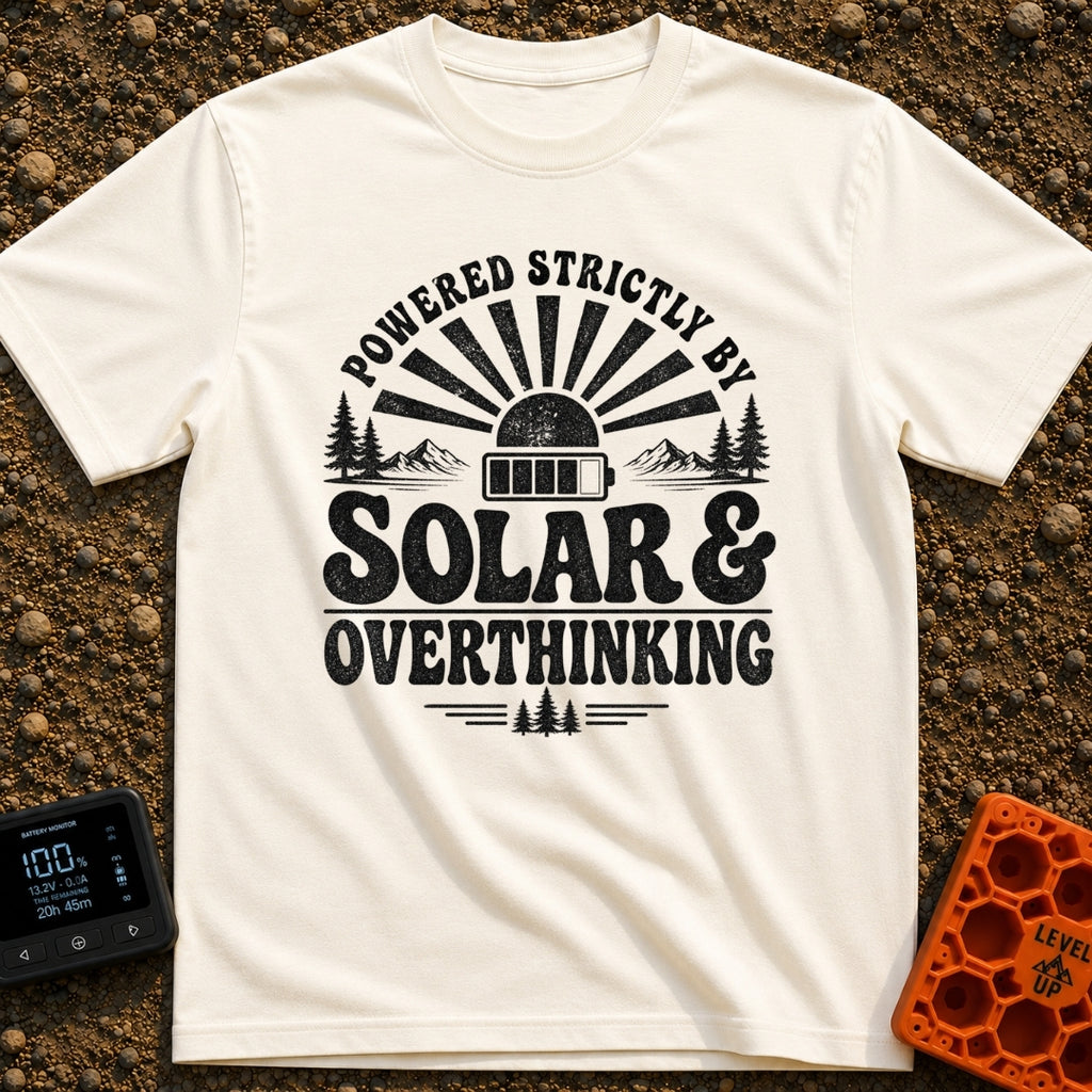 Solar Powered Overthinking - T-Shirt in Ivory - A distressed, black-and-white typographic design reading 'POWERED...