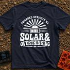 Solar Powered Overthinking - T-Shirt in Navy - A distressed, black-and-white typographic design reading 'POWERED STRICTLY...