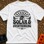 Solar Powered Overthinking - T-Shirt in White - A distressed, black-and-white typographic design reading 'POWERED...