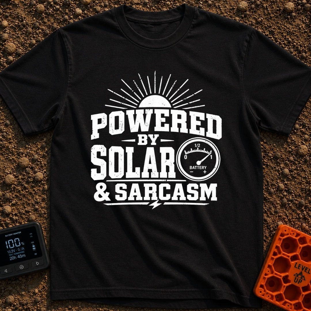 Solar Powered Snark - T-Shirt in Black - A distressed typography design reading "POWERED BY SOLAR & SARCASM" featuring a...