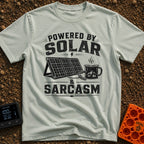 Solar Powered Sarcasm - T-Shirt in Bay - A distressed black and white illustration showing the text "POWERED BY SOLAR &...