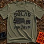 Solar Powered Sarcasm - T-Shirt in Moss - A distressed black and white illustration showing the text "POWERED BY SOLAR &...