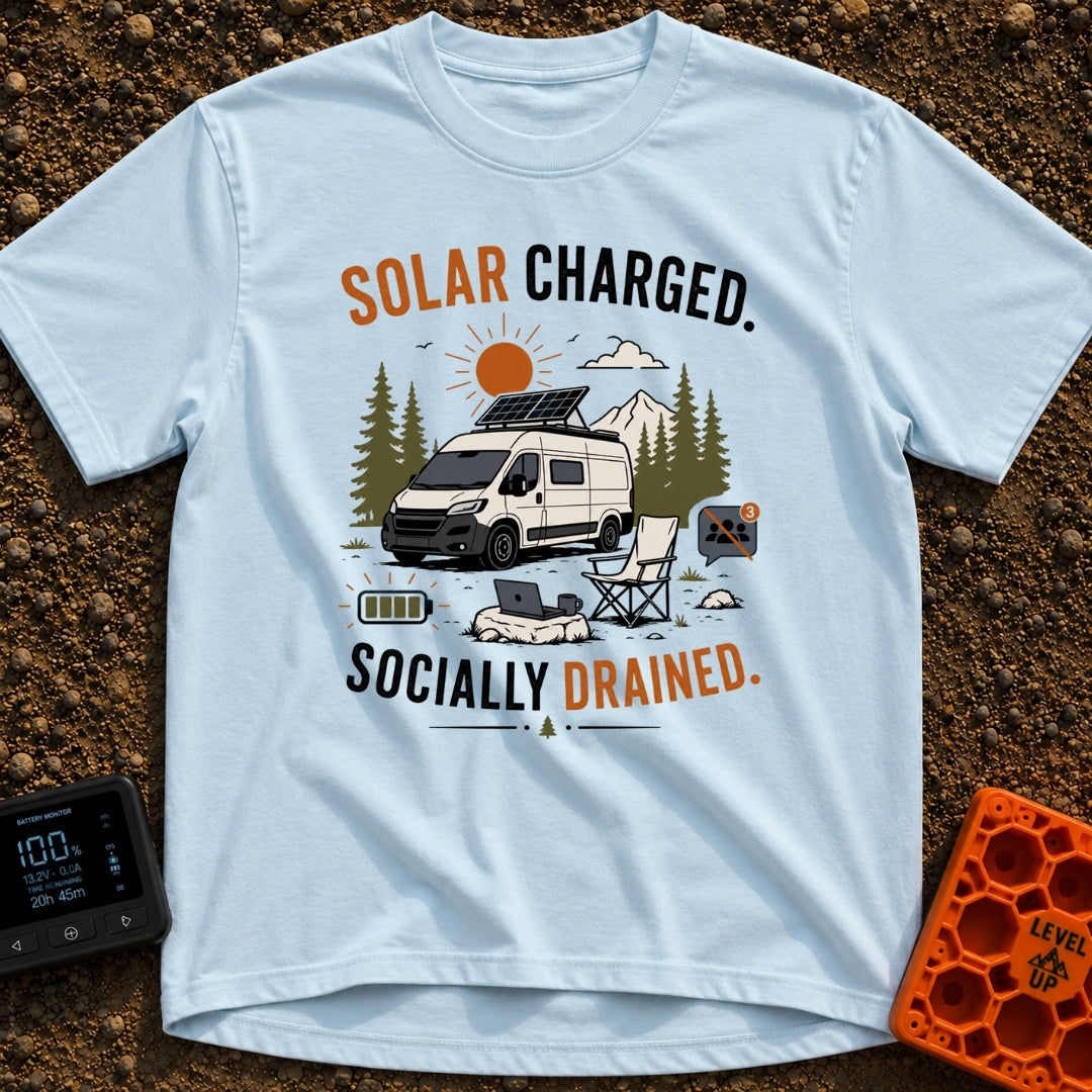 Solar Charged Socially Done - T-Shirt in Chambray - A white camper van with a tilted roof solar panel is parked near pine...