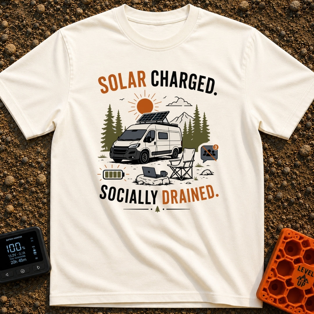 Solar Charged Socially Done - T-Shirt in Ivory - A white camper van with a tilted roof solar panel is parked near pine...