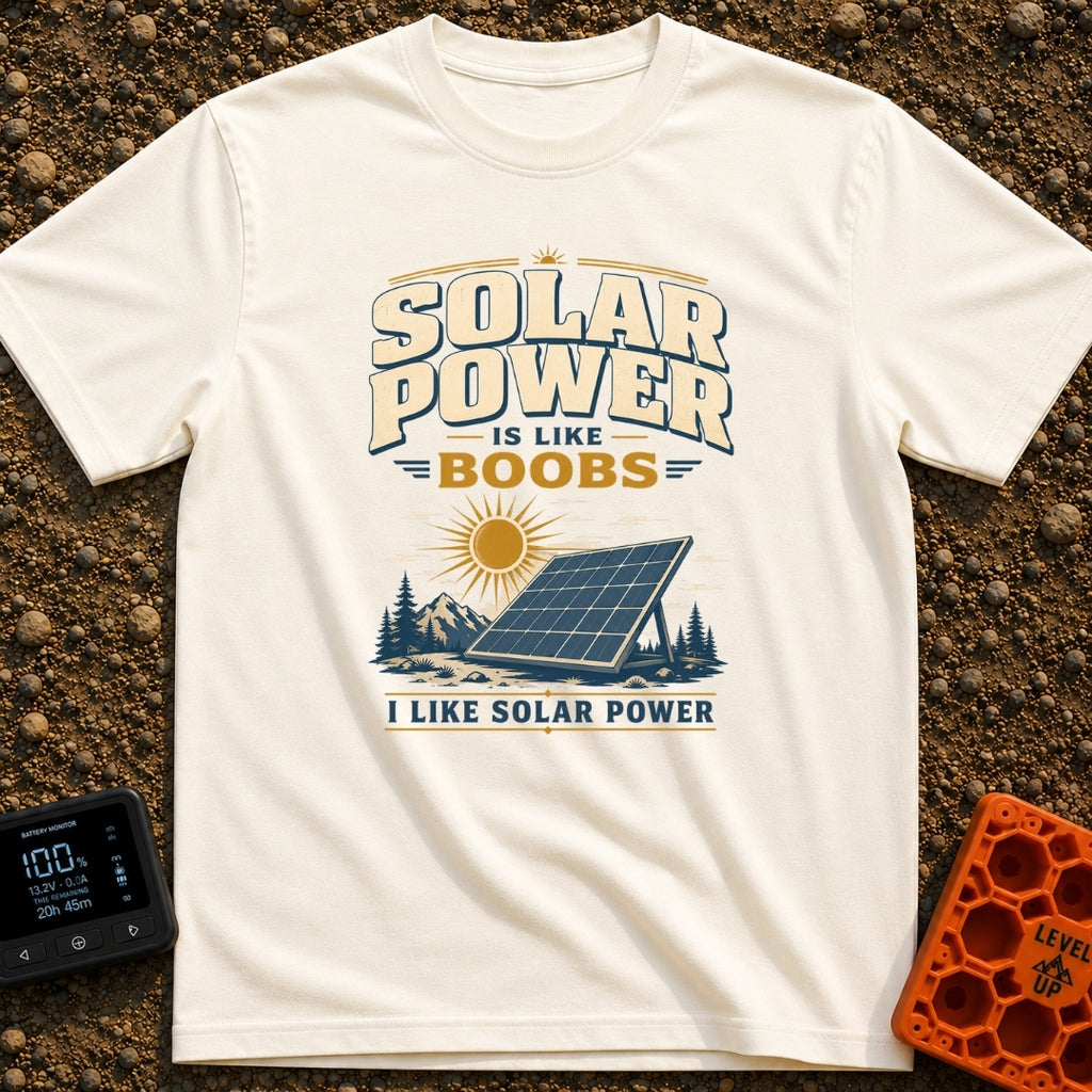 Solar Is Like Boobs - T-Shirt in Ivory - A large, freestanding solar panel sits on the ground in a natural landscape...