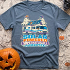 Supernaturally Solar Powered - T-Shirt in Blue Jean - A cartoon illustration of two ghosts wearing sunglasses and...