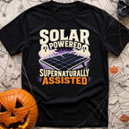 Supernaturally Solar Powered - T-Shirt in Black - An illustration of a solar panel on a stand being zapped with purple...