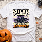 Supernaturally Solar Powered - T-Shirt in White - An illustration of a solar panel on a stand being zapped with purple...