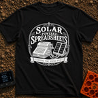 Solar Powered Pivot Tables - T-Shirt in Black - A vintage mechanical adding machine is shown wired directly to a portable...