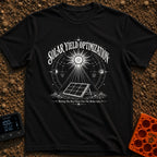 Squeezing Every Last Watt - T-Shirt in Black - A black and white line-art illustration showing a portable solar panel...