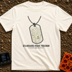 Standard Issue Freedom - T-Shirt in Ivory - A line-art illustration of a military dog tag hanging from a beaded chain,...