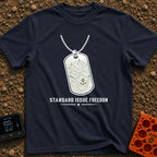 Standard Issue Freedom - T-Shirt in Navy - A line-art illustration of a military dog tag hanging from a beaded chain,...